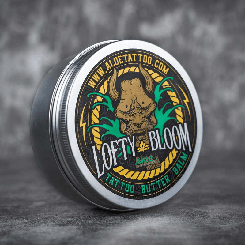 Tin of Lofty Bloom tattoo butter balm 
