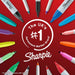 Sharpie markers in various colors arranged around a circular logo on a red background.